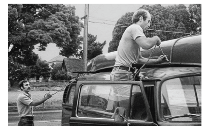 Ted Hill walking a “punishment tour” at Camp Buckner during summer training in 1963